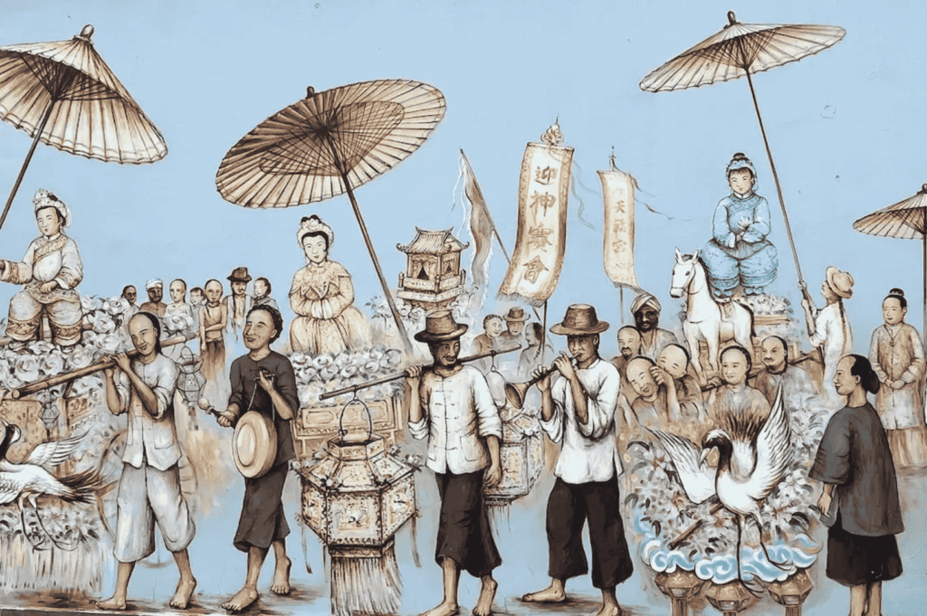 Traditional Chinese festival procession painted in vivid detail on a mural wall, part of the vibrant Singapore art scene where street art, urban art, and graffiti by local and international artists transform public spaces into living art exhibitions. This visual arts depiction—rich with traditional attire, ceremonial banners, and symbolic motifs—echoes works seen at the Singapore Art Museum, National Gallery Singapore, and during the Singapore Biennale, showcasing art forms from fine arts to performing arts. Located near Victoria Street, Little India, and main streets lined with boutique shops, shops, and streets in neighbourhood hubs like Haji Lane, Clive Street, Kerbau Road, Rowell Road, Ann Siang Hill, Tiong Bahru, and Chinatown, it reflects the multicultural society of Singapore—a young nation in the Asia Pacific region and Southeast Asia. Influences from Chinese immigrants, India, China, and Asia blend with modern and art deco styles, much like works by Yip Yew Chong, Ernest Zacharevic, and Novena Angela, who have helped develop art in Singapore in a modern way. The scene connects history, culture, life, music, food, and ideas with important role heritage supported by the National Heritage Board, Nanyang Academy, and Art SG, celebrating emerging artists, the new generation, and international artists. From early exhibitions to contemporary scene highlights in the central business district, main road corridors, and events inspired by Crazy Rich Asians, this collection of sculptures, art, and inspired works cements Singapore’s place in the world of creativity.