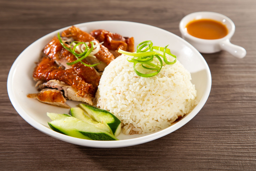 Singapore Food Culture : Steamed chicken paired with fragrant rice cooked in broth