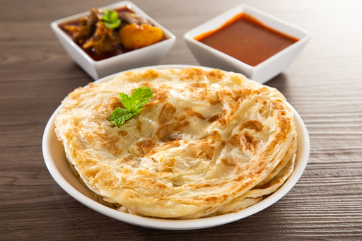 Singapore Food Culture : Roti Prata served with fragrant mutton curry