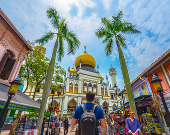 Exploring Kampong Glam Heritage : Visitors walking through the historic lanes