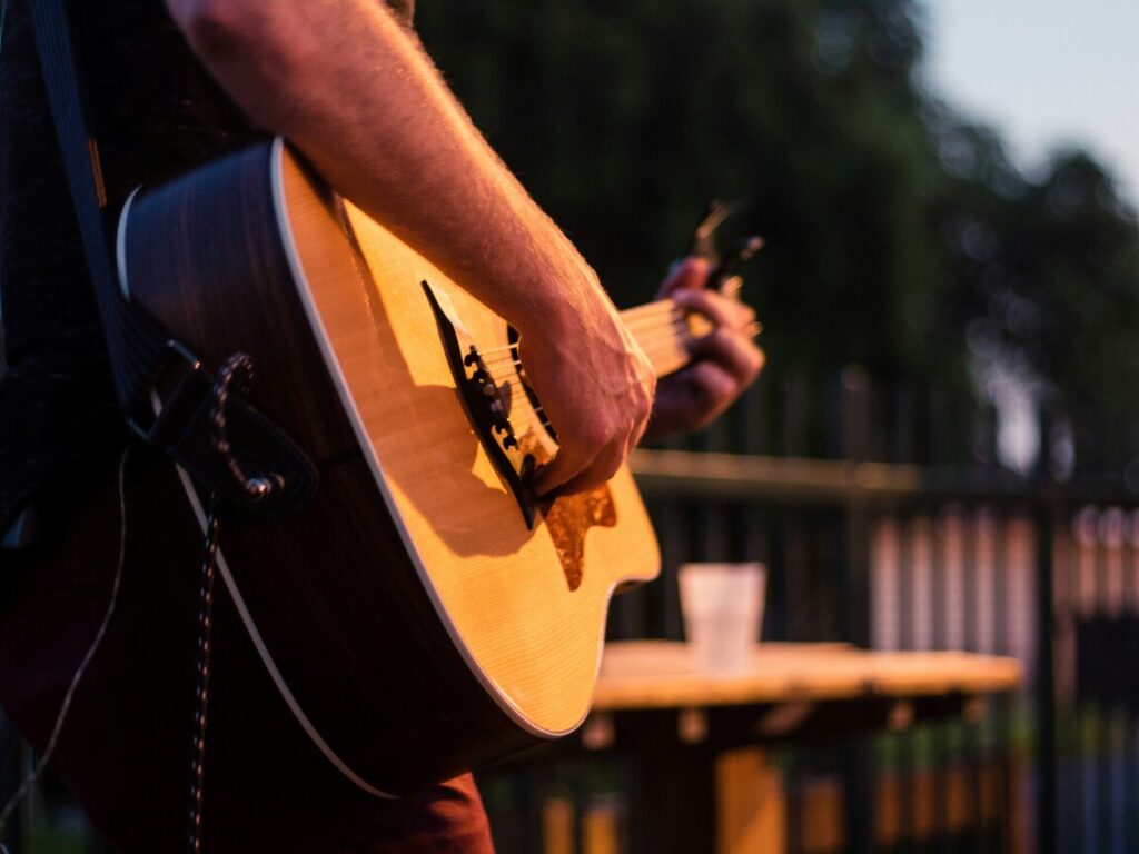 Community Markets Singapore : Visitors enjoying live music and dance performances at a bustling market.
