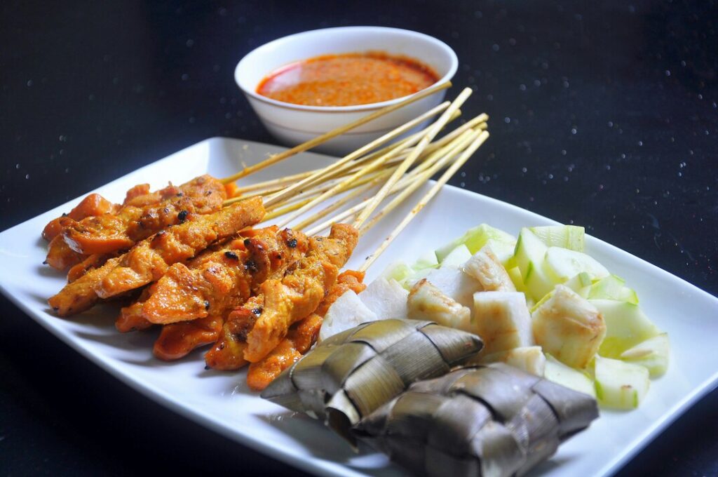 Exploring Kampong Glam Heritage : Traditional satay serving freshly grilled meat with peanut sauce.