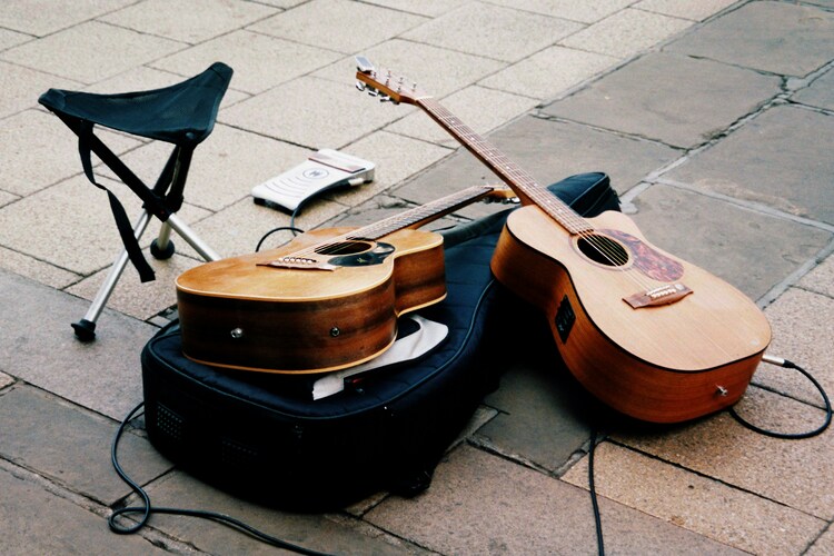 Community Markets Singapore : Bustling atmosphere with laughter, busker music, and fragrant market goods.