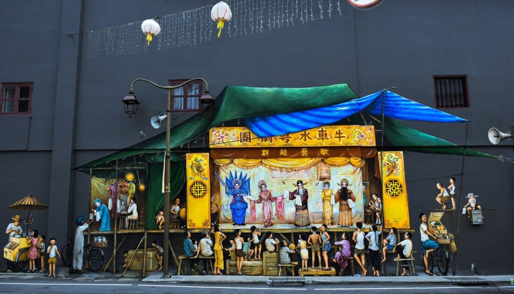 Singapore Public Art : A colourful mural depicting community life painted on the wall