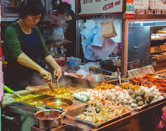 Community Markets Singapore : Night market stalls with sizzling skewers and vibrant street food.