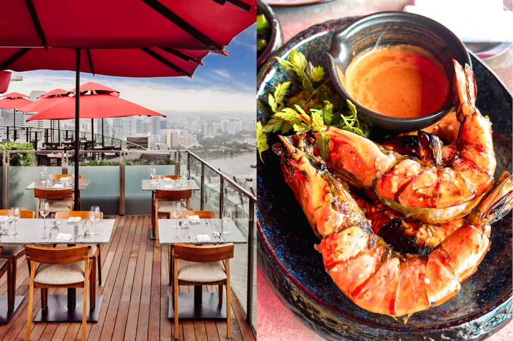 Left: eye‑level wide shot of an outdoor rooftop dining area with wooden tables, red umbrellas, and city skyline views. Right: close‑up angled shot of grilled prawns served with dipping sauce in a dark ceramic bowl.