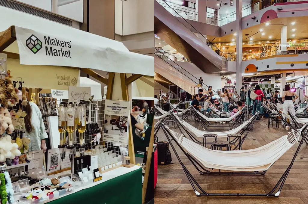 Eye‑level wide shot of an indoor makers market featuring handcrafted goods on display at vendor booths, paired with a spacious mall atrium setup with hammocks and seating areas, highlighting modern pop‑up retail experiences and lifestyle markets.