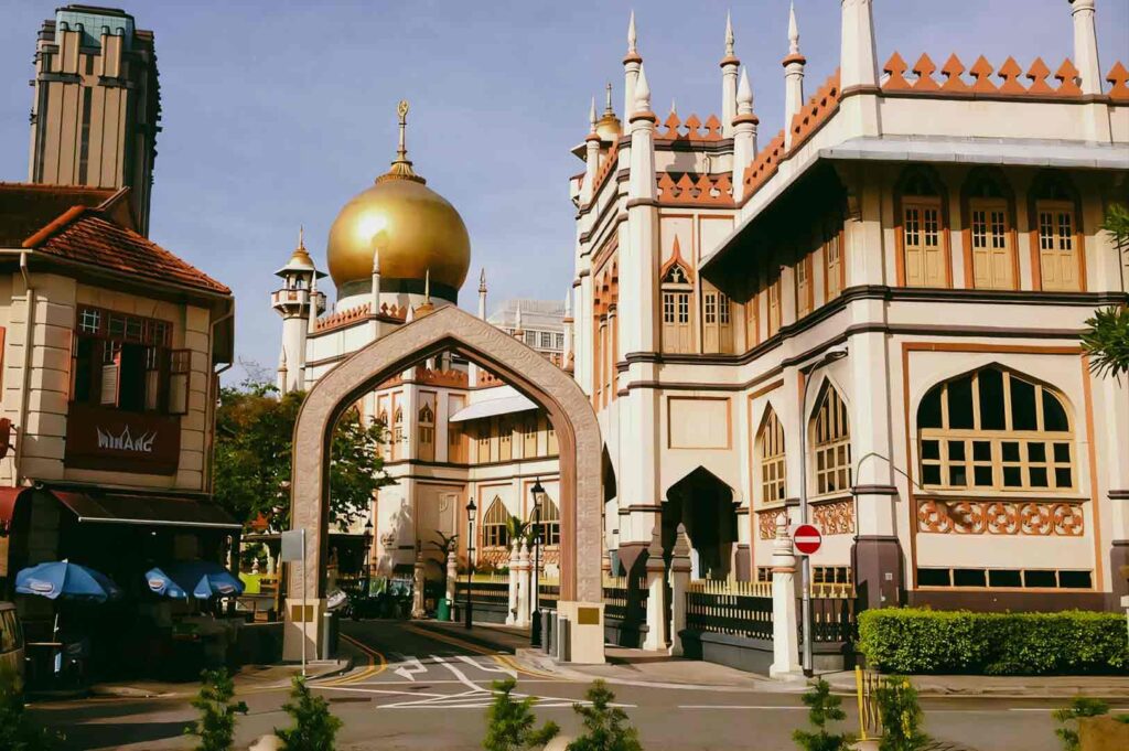 Eye-level wide shot of Sultan Mosque in Kampong Glam, featuring Islamic architecture and Malay heritage, reflecting Singapore’s multicultural cultural districts.