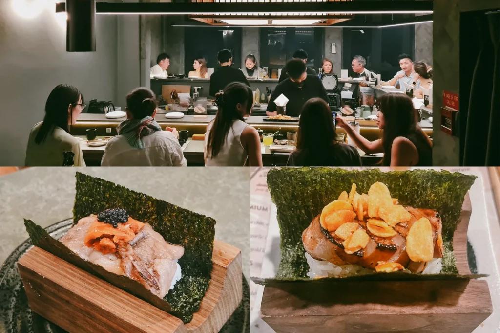 Upper Image: wide-angle eye-level view of a Japanese handroll bar interior with diners seated around a counter, chefs preparing food behind the bar, warm overhead lighting, and a modern minimalist setting with wood and metal finishes. Lower Right: close-up three-quarter angle of a sushi handroll topped with sliced meat and crispy chips resting on rice and wrapped in dark nori on a wooden stand, glossy textures highlighted by soft lighting. Lower Left: close-up three-quarter angle of a sushi handroll with layered meat, orange sea urchin, and a small mound of black caviar on rice wrapped in nori, placed on a rectangular wooden base with visible grain.